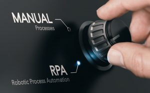 Hand turning a dial from manual process to robotic process automation.