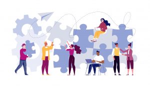 Illustration of business professionals interacting with puzzle pieces.
